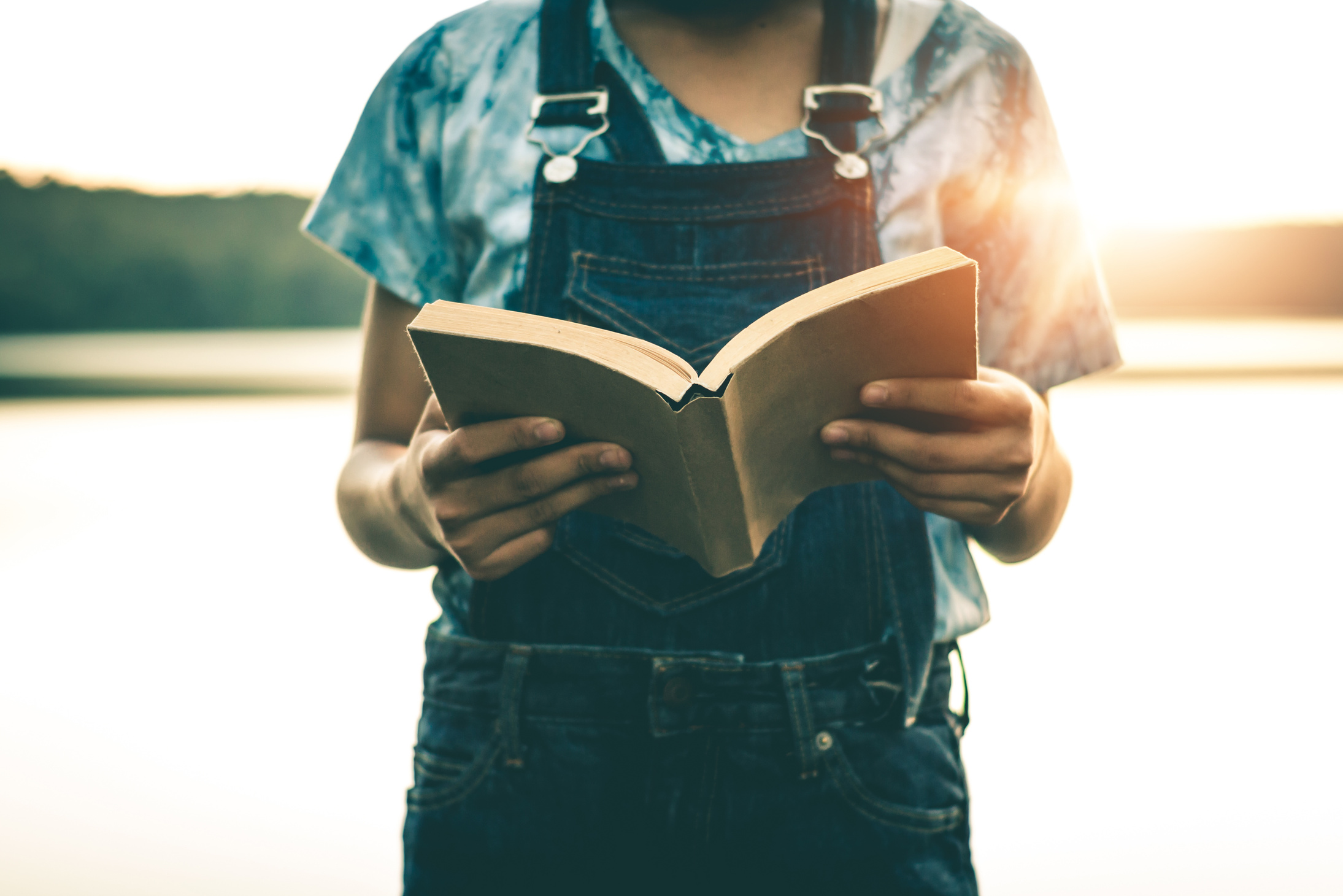 Women read books in quiet nature, concept read a books.