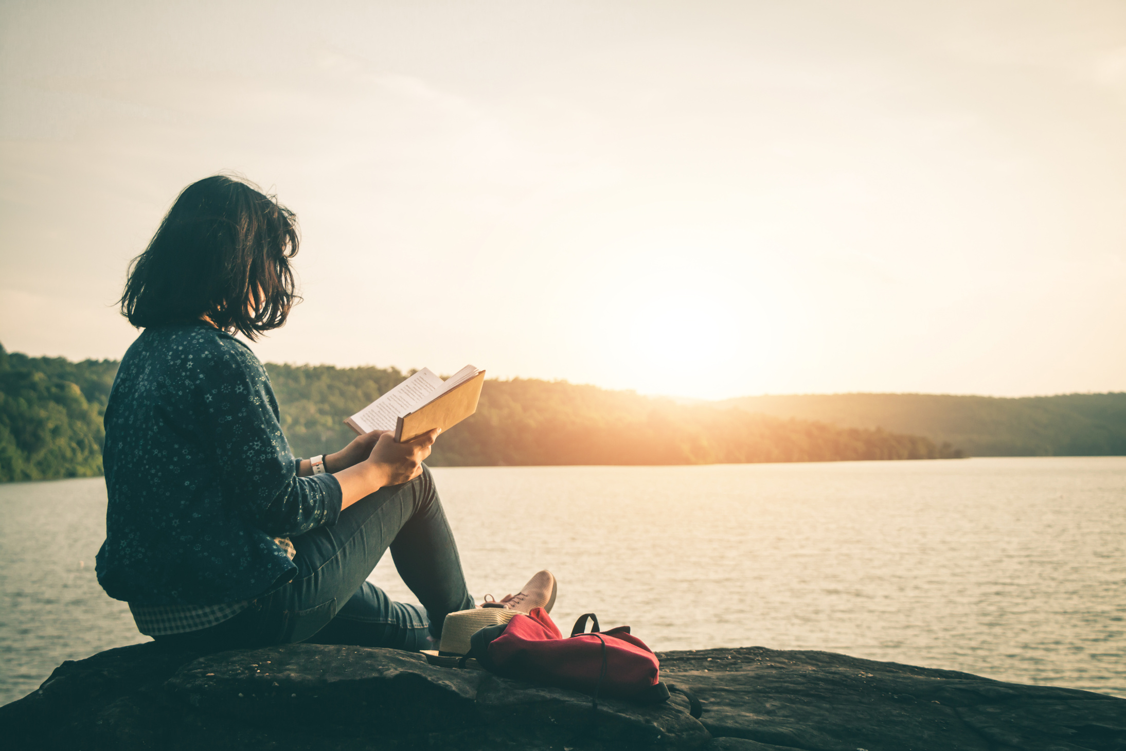 Women read books in quiet nature, concept read a books.